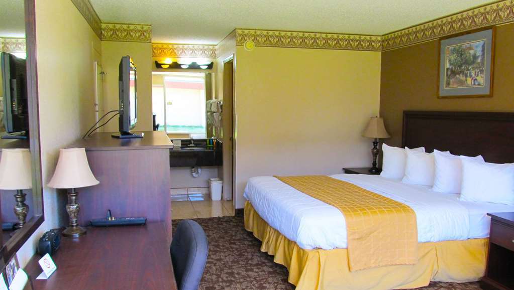 Magnuson Hotel Idabel Стая снимка